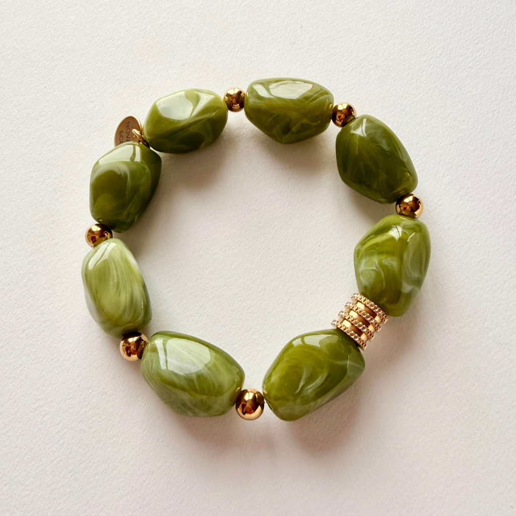 bracelet en grosses perles en resine kaki et acier inoxydable collection clea