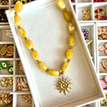 collier grosses perles résine colorée charm