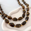 collier en perle résine couleur chocolat et perle en acier inoxydable 